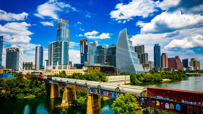 Austin , Texas , USA - September 1st 2022: Aerial Drone View over Austin during a Gorgeous Day along the Colorado River or Lady Bird Lake with a perfect Futuristic Skyline Background.