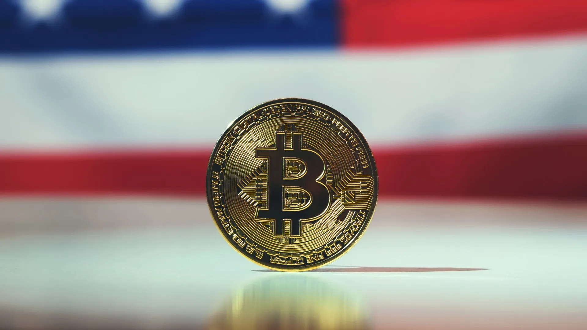 Bitcoin Against the American Flag stock photo