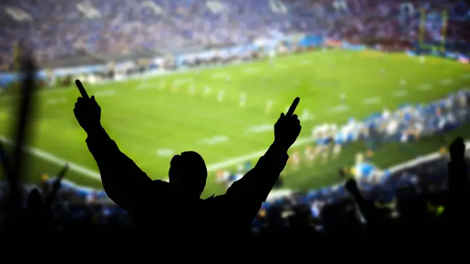 Excited fans at a football game.