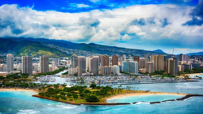 The beautiful coastline Honolulu Hawaii shot from an altitude of about 500 feet during a helicopter photo flight over the Pacific Ocean.