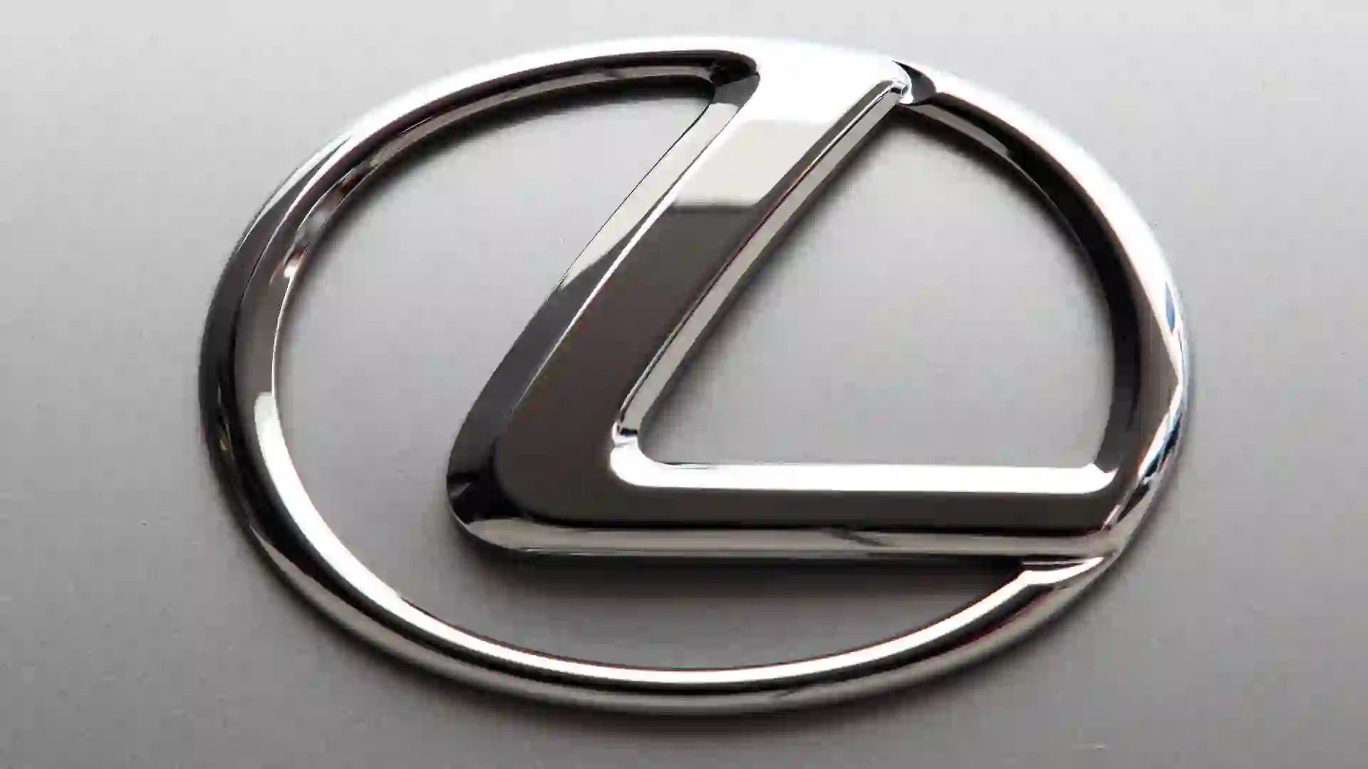 Kagoshima, Japan - August 7, 2011: Lexus logo on the trunk of a new hybrid Lexus GS 450h car identifies a vehicle made by that company.