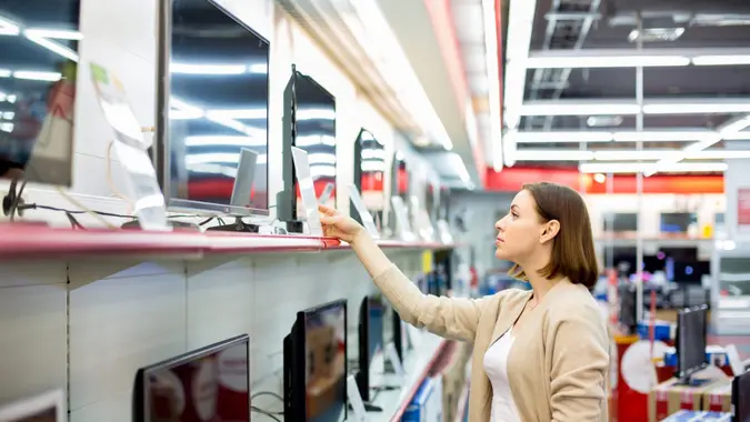 woman buys the TV.