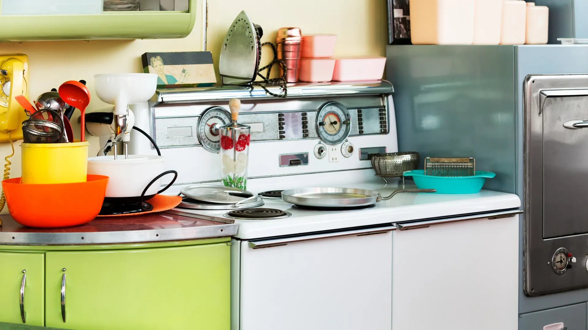 A kitchen with clutter.