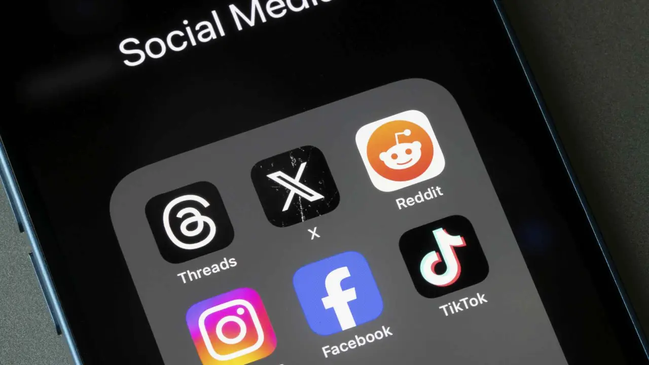 Portland, OR, USA - Oct 26, 2023: Assorted social media apps, including Threads, X, Reddit, Instagram, Facebook, and TikTok, are seen on an iPhone.