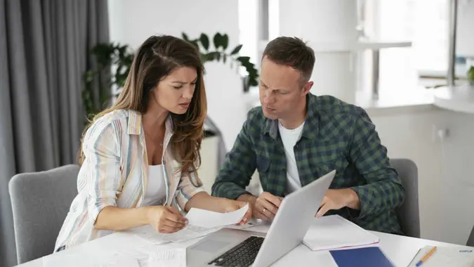 Paying Off Debt as a Couple: 6 Tips for a 2-Paycheck Household