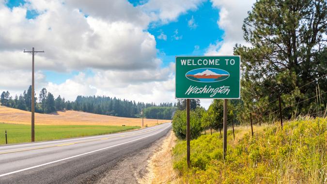 A roadside welcome to Washington State sign in the rural Palouse area near Spokane, Washington, USA.