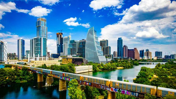 Austin , Texas , USA - September 1st 2022: Aerial Drone View over Austin during a Gorgeous Day along the Colorado River or Lady Bird Lake with a perfect Futuristic Skyline Background.