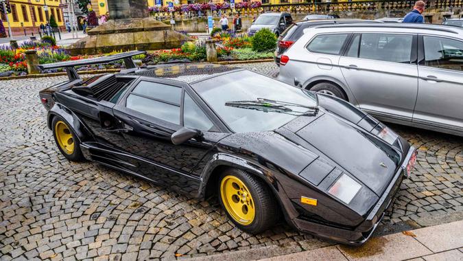 Fulda, Germany - 13 July 2019: black Lamborghini Countach is a rear mid-engine, rear-wheel-drive sports car.