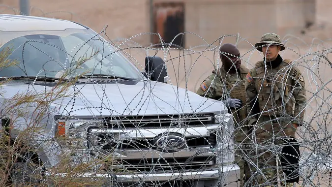 Members of the United States National Guard guard the border with Mexico in Juarez City, Mexico, 29 February 2024.