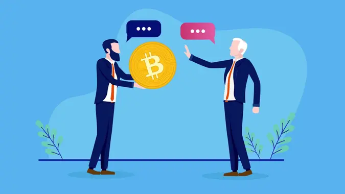 Two people having a disagreement over crypto currency, discussing and debating.