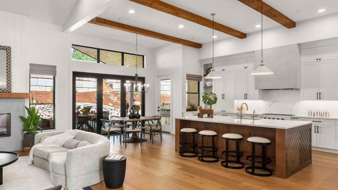 kitchen and living room in newly constructed luxury home.