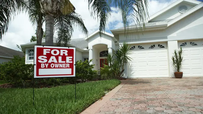 Florida house and/or home for sale with appropriate sign -stock photo