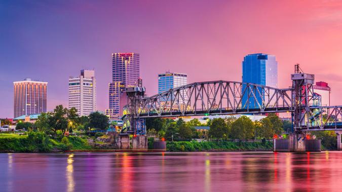 Little Rock, Arkansas, USA skyline on the river at twilight.