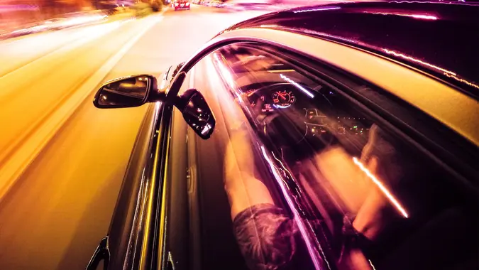 Crazy ride on the night by car stock photo