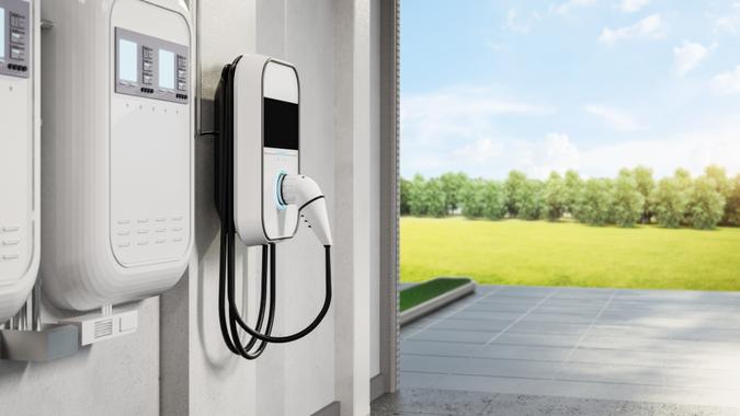 3d rendering ev charger or wall charger at home garage.