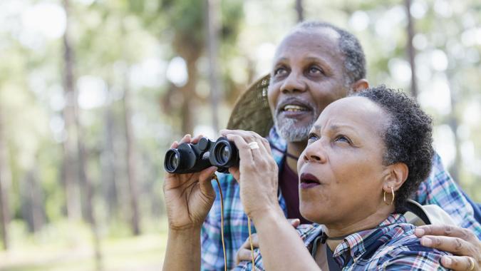 senior couple bird watching