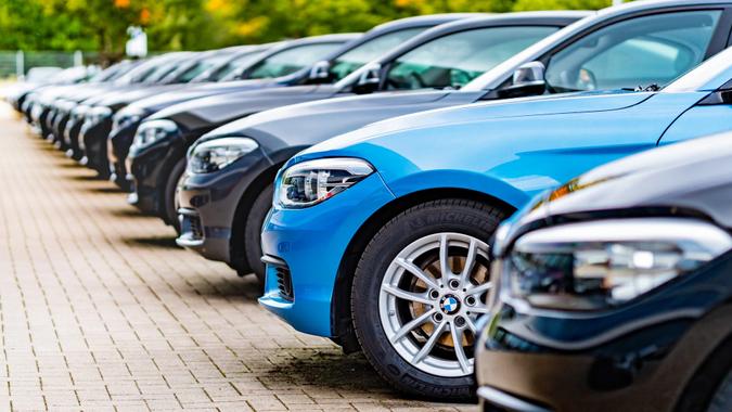 A row of used BMW cars parked at a public car dealership in Hamburg, Germany stock photo