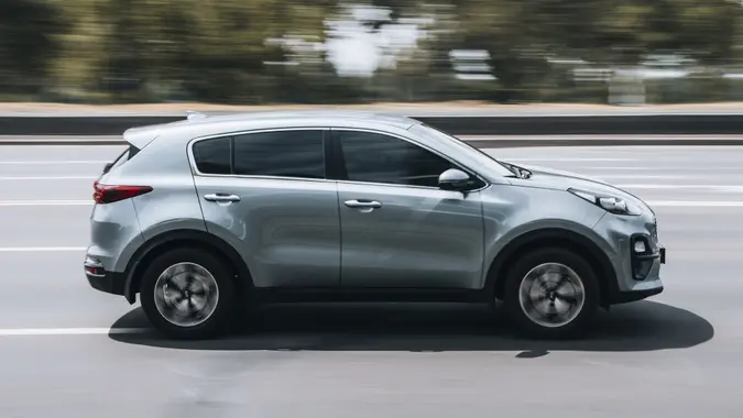 Ukraine, Kyiv - 27 June 2021: Silver KIA Sportage car moving on the street. Editorial stock photo