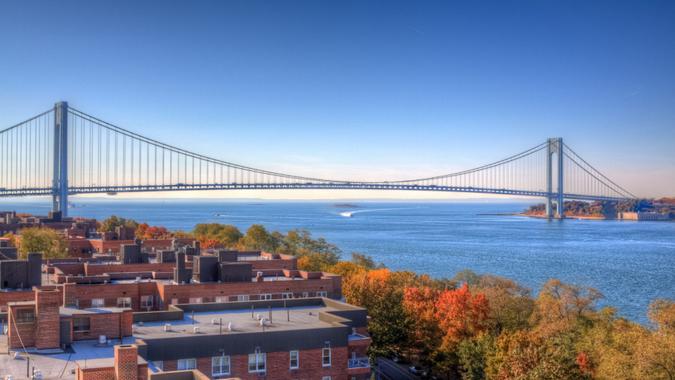 HDR - High Dynamic Range Image (photorealistic) of the bridge and lush foliage, lit by autumn morning sun.