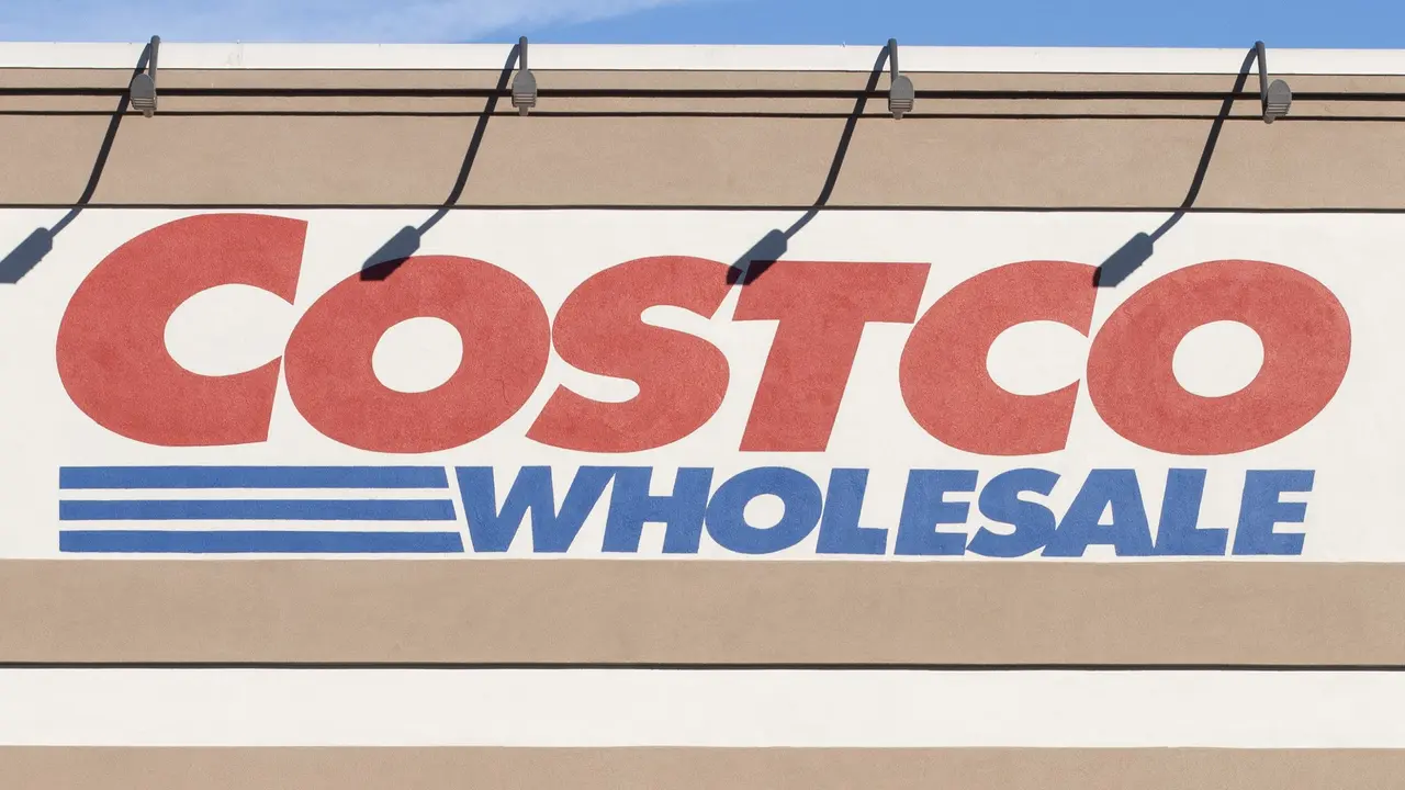Costco Wholesale sign on a building in Aloha, Oregon for stock photo.