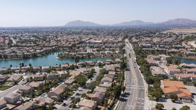 Daytime aerial view of a suburban neighborhood in Moreno Valley, California, USA.