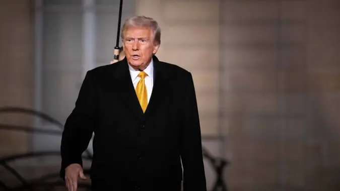 US president-elect Donald Trump leaves after a meeting at The Elysee Presidential Palace in Paris on December 7, 2024.