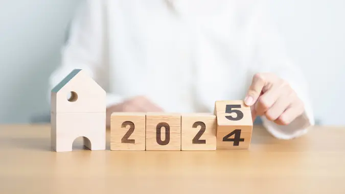 2024 end year to Happy New Year 2025 with house model.
