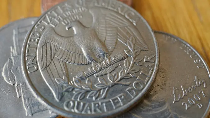 Set of silver Quarter Dollar coins (currency in the USA) stock photo
