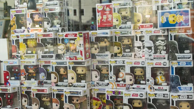 Row of figures of American company Funko Pop in the shop window stock photo