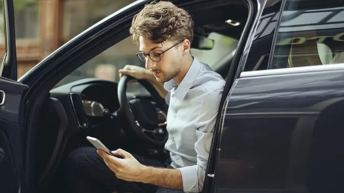 Man driving his car stock photo