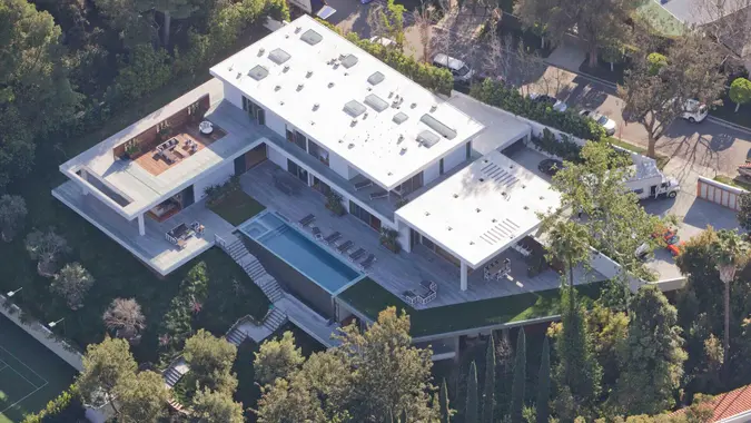 Delivery trucks outside $150k a month mansion Beyonce and Jay-Z are rumored to be renting in the Holmby Hills area of Los Angeles.