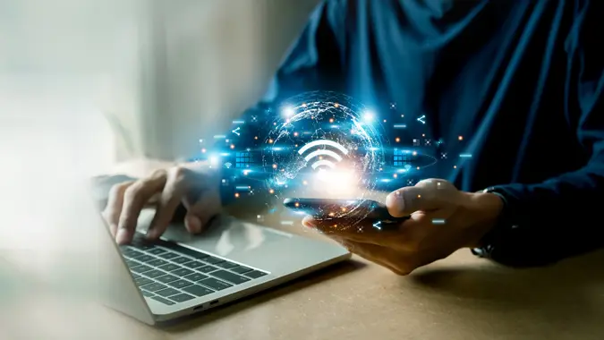 Business using smartphone ,with wifi icon,business communication social network concept.
