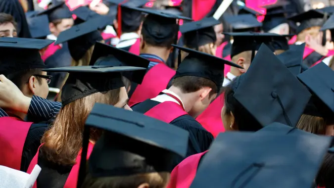 &ldquo;Cambridge, MA, USA - May 26, 2011: Students of Harvard University gather for their graduation ceremonies on Commencement Day, May 26, 2011 in Cambridge, MA, USA.