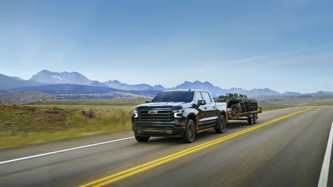 2025 Chevrolet Silverado 1500 towing a trailer.