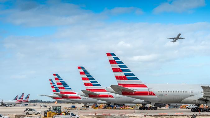 Miami, USA - November 4, 2020: America Airlines planes waiting for passengers at Miami International Airport.