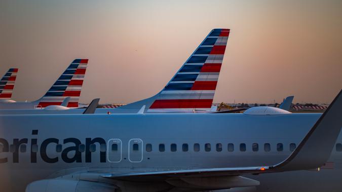 American Airlines tails and fuselage at sunrise at Dallas Fort Worth International Airport in Oct 2024.