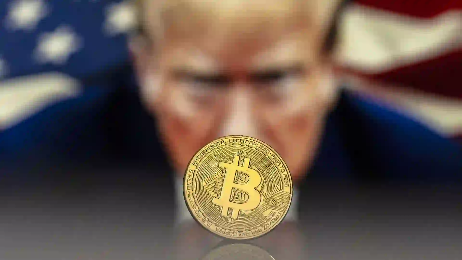 An illustration shows a Bitcoin in front of an image of President Donald Trump