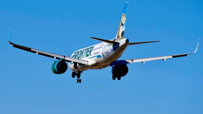Chantilly, Virginia, USA - March 9, 2025: Frontier Airlines flight #FFT4812 aboard “Hazel the Chipmunk” — an Airbus A320-251N (registration #N332FR) — lands at Washington Dulles International Airport after originating earlier in the afternoon at Orlando, Florida.