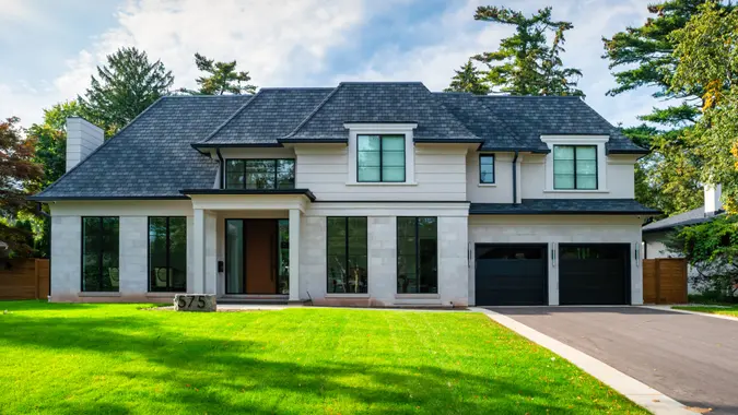 Newly built luxury home in Mississauga, Ontario, Canada on a sunny day.