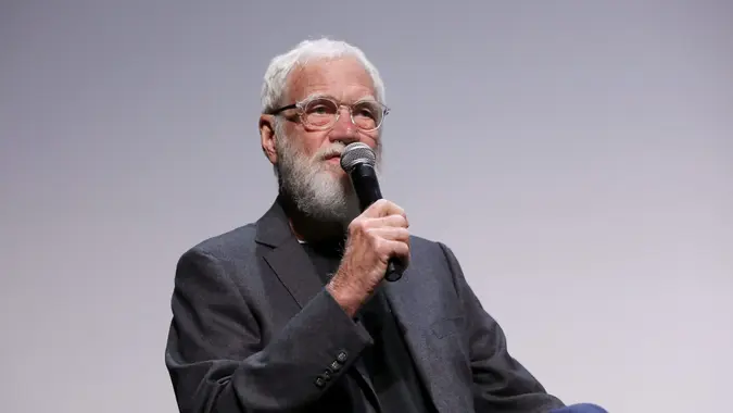 David Letterman speaking into a microphone.