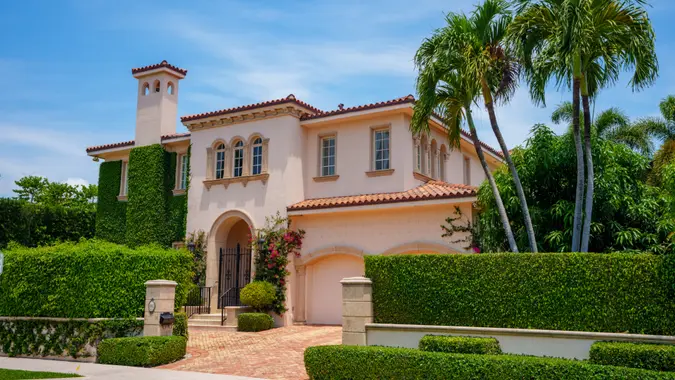 Palm Beach, FL, USA - May 11, 2023: Photo of a luxury mansion home in Palm Beach.