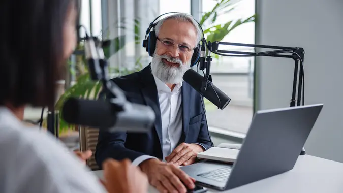 On Air Business Podcast Featuring Senior Host and Black Guest stock photo