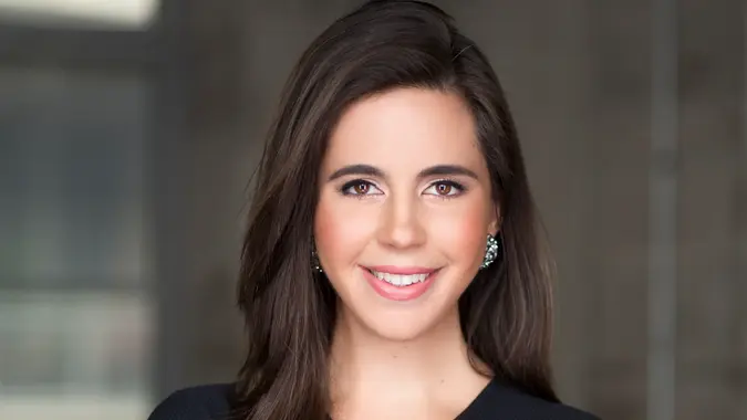 Realtor Samantha DeBianchi smiling with a neutral background