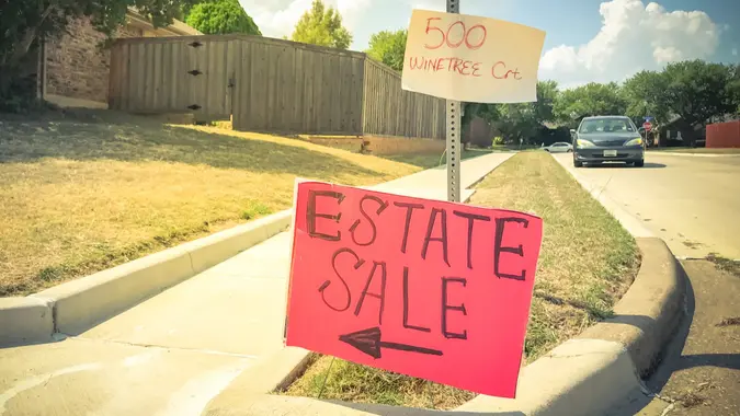 Filtered image red estate sale sign with address near Dallas stock photo