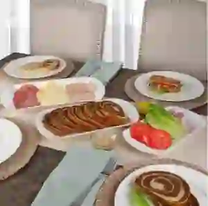 Coscto Mikasa Nellie Oval Platter Set of three displayed on a table with food and matching plates.