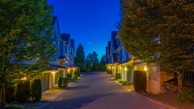 Townhouses, homes, community at dusk, night time in suburbs of Vancouver, Canada.