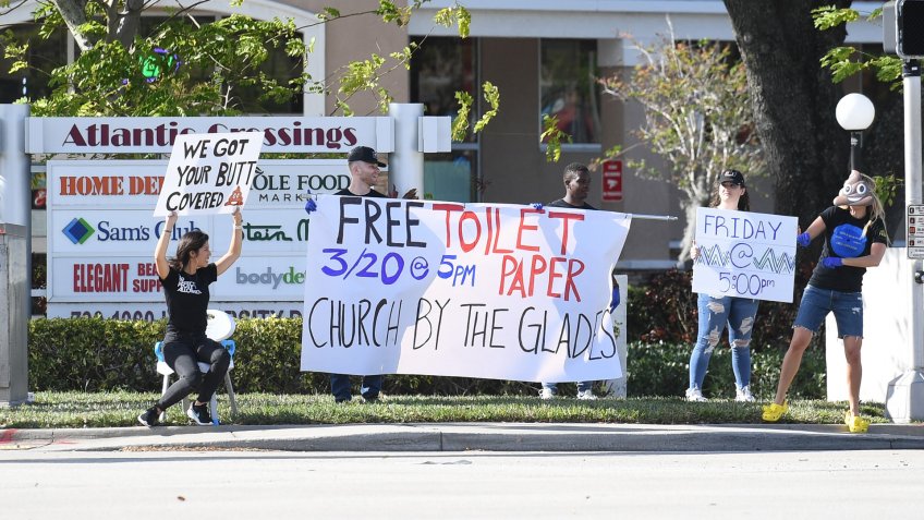 People offering free toilet paperCoronavirus Outbreak, Coral Springs, USA - 19 Mar 2020.