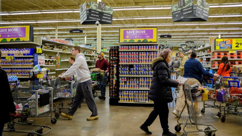 Shoppers fill a Kroger grocery store stripping many shelves clean of merchandise, during the Covid-19 national emergencyCoronavirus Outbreak, Bloomington, USA - 18 Mar 2020Indiana governor Eric Holcomb banned in-person dining in all restaurants, shut down all bars, in the Indiana.