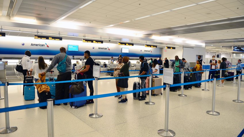 Empty check in lanes are seen at Miami International Airport amid COVID-19 pandemic.