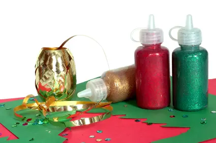 Christmas themed glitter, string, festive paper